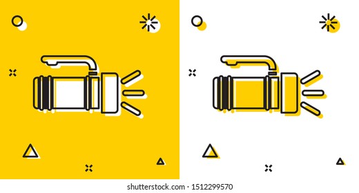 Black Flashlight icon isolated on yellow and white background. Tourist flashlight handle. Random dynamic shapes. Vector Illustration