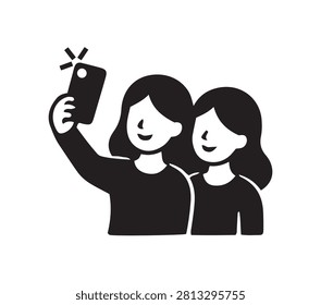A black flat icon depicting two women taking a selfie with a smartphone. The image is isolated on a white background, representing modern communication and friendship.