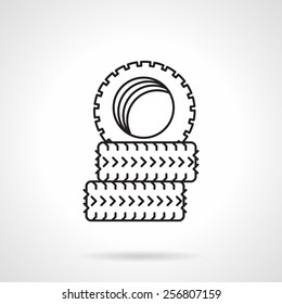 Black flat line vector icon for set of tires for auto service or some sport on white background.