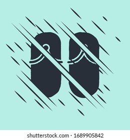 Black Flip flops icon isolated on green background. Beach slippers sign. Glitch style. Vector Illustration