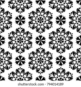 Black floral design on white background. Seamless pattern for textile and wallpapers