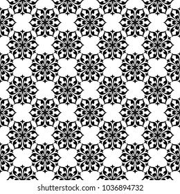 Black floral ornament on white background. Seamless pattern for textile and wallpapers