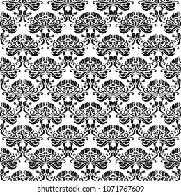 Black floral ornament on white background. Seamless pattern for textile and wallpapers