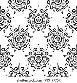 Black floral ornament on white background. Seamless pattern for textile and wallpapers