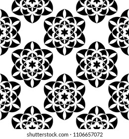Black flowers on white background. Seamless pattern for textile and wallpapers