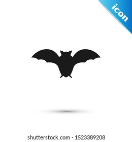 Black Flying bat icon isolated on white background.  Vector Illustration