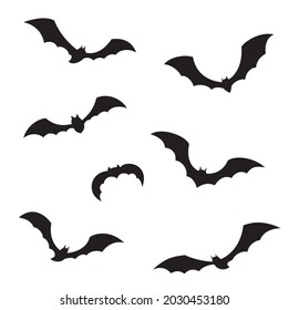 Black flying bats silhouettes. Vector set for halloween.