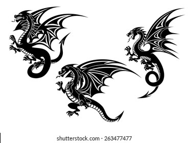 Black flying dragons with carved wings in tribal style isolated on white background for tattoo or mascot design