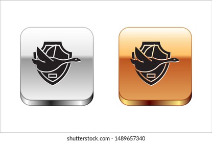 Black Flying duck on shield icon isolated on white background. Hunting trophy on wall. Silver-gold square button. Vector Illustration