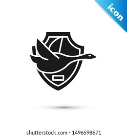 Black Flying duck on shield icon isolated on white background. Hunting trophy on wall. Vector Illustration Black Flying duck on shield icon isolated on white background. Hunting trophy on wall. Vector Illustration