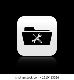 Black Folder with screwdriver and wrench icon isolated on black background. Adjusting, service, setting, maintenance, repair, fixing. Silver square button. Vector Illustration