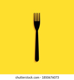 Black Fork icon isolated on yellow background. Long shadow style. Vector.