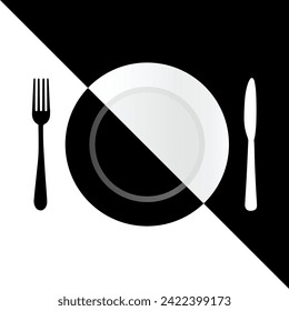 Black fork, white knife and half black and half white plate 