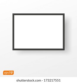 Black frame on white plane with free place for your image