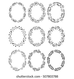 Black frames with leaves and flowers. Vector oval wreaths isolated on white background.