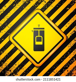 Black French press icon isolated on yellow background. Warning sign. Vector Illustration