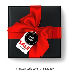Black friday gift box with red bow ribbon and discount tag with SALE text. Holiday decoration. Vector object isolated on white