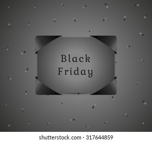 black friday gift with black confetti on dark gray gradient background