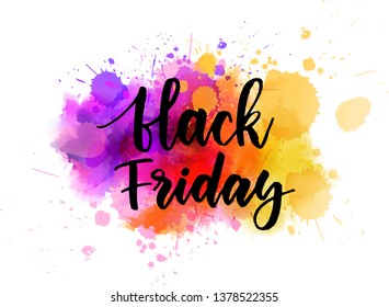 Black friday - handwritten modern calligraphy text on watercolor paint splash.