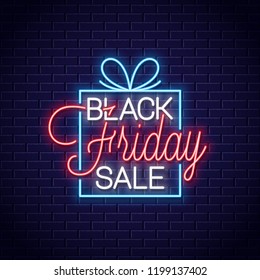 Black friday neon banner. Gift box sale neon sign on wall background