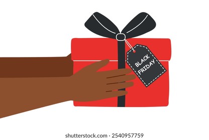 Caja de regalo roja del viernes negro con la etiqueta del Precio en manos humanas. Black Friday y concepto de venta. Concepto de compras.