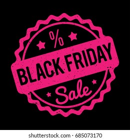 Black Friday rubber stamp black on a pink background.