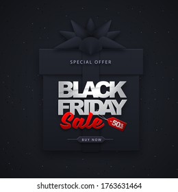 Black friday sale banner with gift box silhouette on dark black background