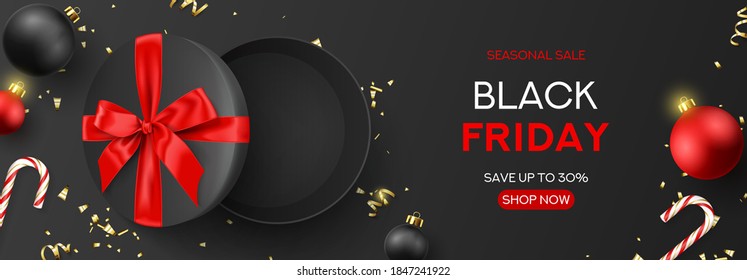 Black Friday sale banner template. Holiday background with round gift box, Christmas balls, candy canes and confetti on dark background. Horizontal banner for Black Friday sale. Vector illustration.