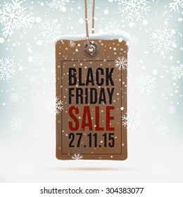 Black Friday sale. Realistic, vintage price tag on winter background wit snow and snowflakes. Vector illustration.