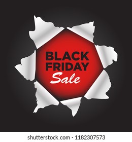 Black friday sale with ripped paper background