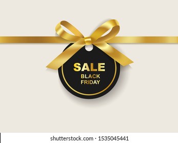 Black Friday sale black tag with golden ribbon and bow isolated on background. Vector of discount label.