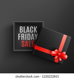 Black friday sale vector illustration with open dark gift box with sign on bottom and red ribbon and bow in realistic 3d style - isolated present package for holiday special offer promotion design.