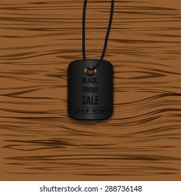 Black friday sale. Vintage label on wooden background. Vector illustration
