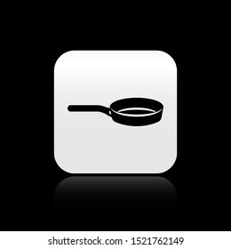 Black Frying pan icon isolated on black background. Fry or roast food symbol. Silver square button. Vector Illustration