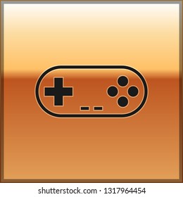 Black Gamepad icon isolated on gold background. Game controller. Vector Illustration