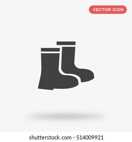 Black garden boots vector icon on white background