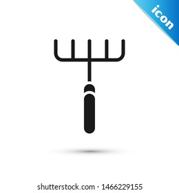 Black Garden rake icon isolated on white background. Tool for horticulture, agriculture, farming. Ground cultivator. Housekeeping equipment.  Vector Illustration