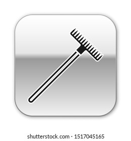 Black Garden rake icon isolated on white background. Tool for horticulture, agriculture, farming. Ground cultivator. Housekeeping equipment. Silver square button. Vector Illustration