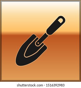 Black Garden trowel spade or shovel icon isolated on gold background. Gardening tool. Tool for horticulture, agriculture, farming.  Vector Illustration