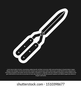 Black Gardening handmade scissors for trimming icon isolated on black background. Pruning shears with wooden handles.  Vector Illustration