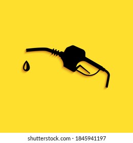 Black Gasoline pump nozzle icon isolated on yellow background. Fuel pump petrol station. Refuel service sign. Gas station icon. Long shadow style. Vector.