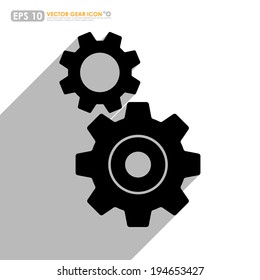 Black gear or cog set icon with shadow on white background