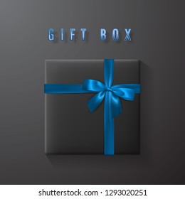 Black gift box with blue bow and ribbon top view. Element for decoration gifts, greetings, holidays. Vector illustration.