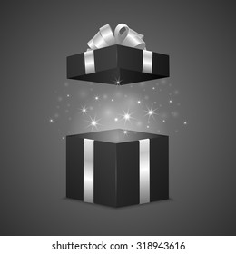 Black gift box with a magic effect. Vector EPS10 illustration.
