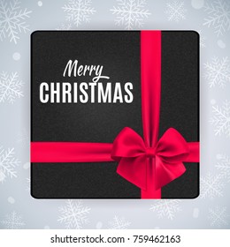 Black gift box with silk red bow, ribbon and merry christmas letters. Vector illustration winter background with snowflake.