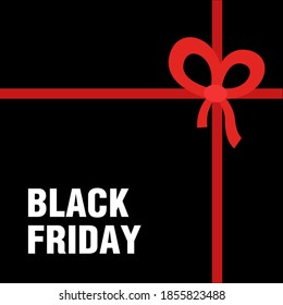 Vista superior de caja de regalo negra con arco rojo y venta de viernes negro, oferta especial.