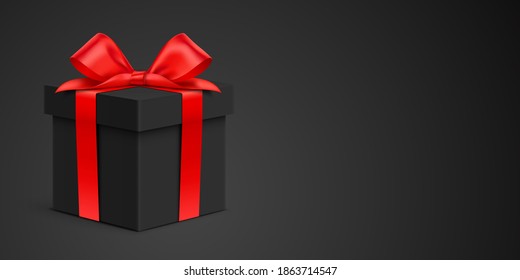 Black gift box, with two loop red ribbon, standing on the black background. Premium style card vector design, with present box, and copy space. Gift card, for fashion, jewelry, or luxury sales offer.