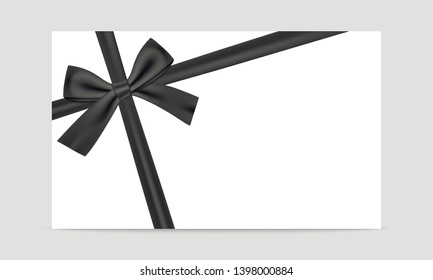 Black gift ribbon and bow on white gift card.