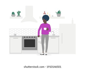 A black girl drinks in her kitchen. A female character holds a mug in her hands. Freelance, work from home. Stay at home on quarantine during the Coronavirus. Vector illustration