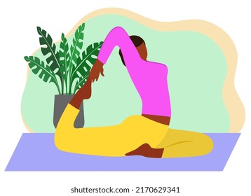 A black girl practices yoga in the Ardha Hamsasana pose (dove pose, half swan pose). The girl practices yoga in the comfort of her own home or in a cozy yoga studio on a mat.